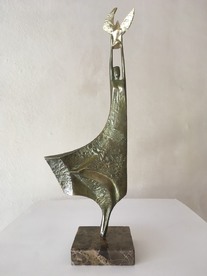 Woman with bird - sculpture by Milko Dobrev